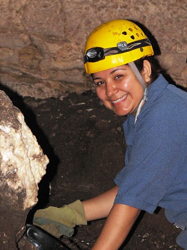 Cristina digging in the trench